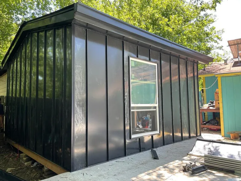 Black standing seam metal wall panels for Roof Inspection in Fort Dodge