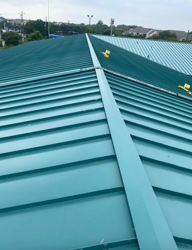 Green commercial metal roof ridge and valley for Metal Roof Repair in Fort Dodge