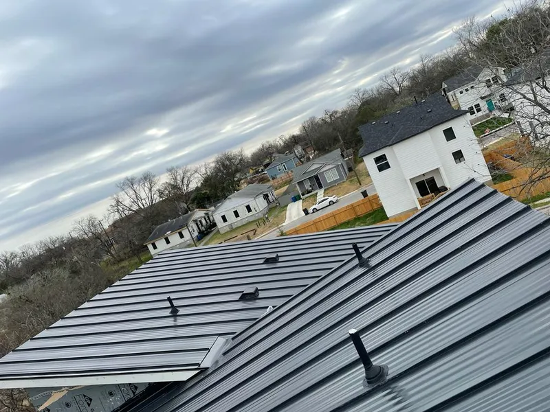 Standing seam metal roof panels with vents for Skylight Repair in Fort Dodge